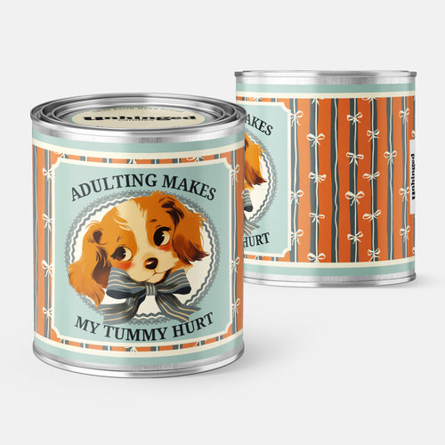 Front and back pic of An Unhinged Paintcan candle with a picture of a vintage Puppy with the phrase "Adulting makes my tummy hurt".