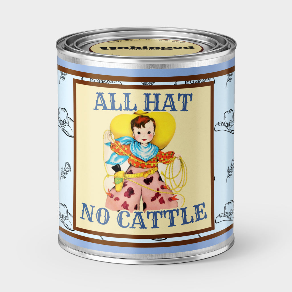 An Unhinged Paintcan candle with a picture of a vintage cowboy with the phrase "All Hat No Cattle".