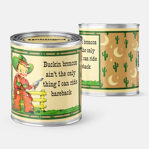 Front and Back pic of An Unhinged Paintcan candle with a picture of a vintage cowboy illustration holding a pistol witht he phrase "buckin broncos ain't the only thing I can ride bareback".
