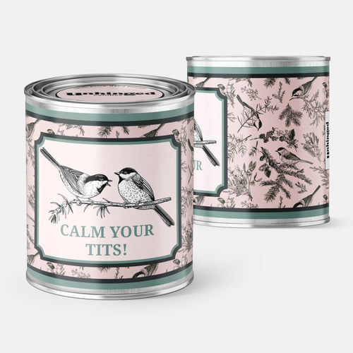 An Unhinged Paintcan candle with a picture of a two birds with the phrase "Calm your tits!"