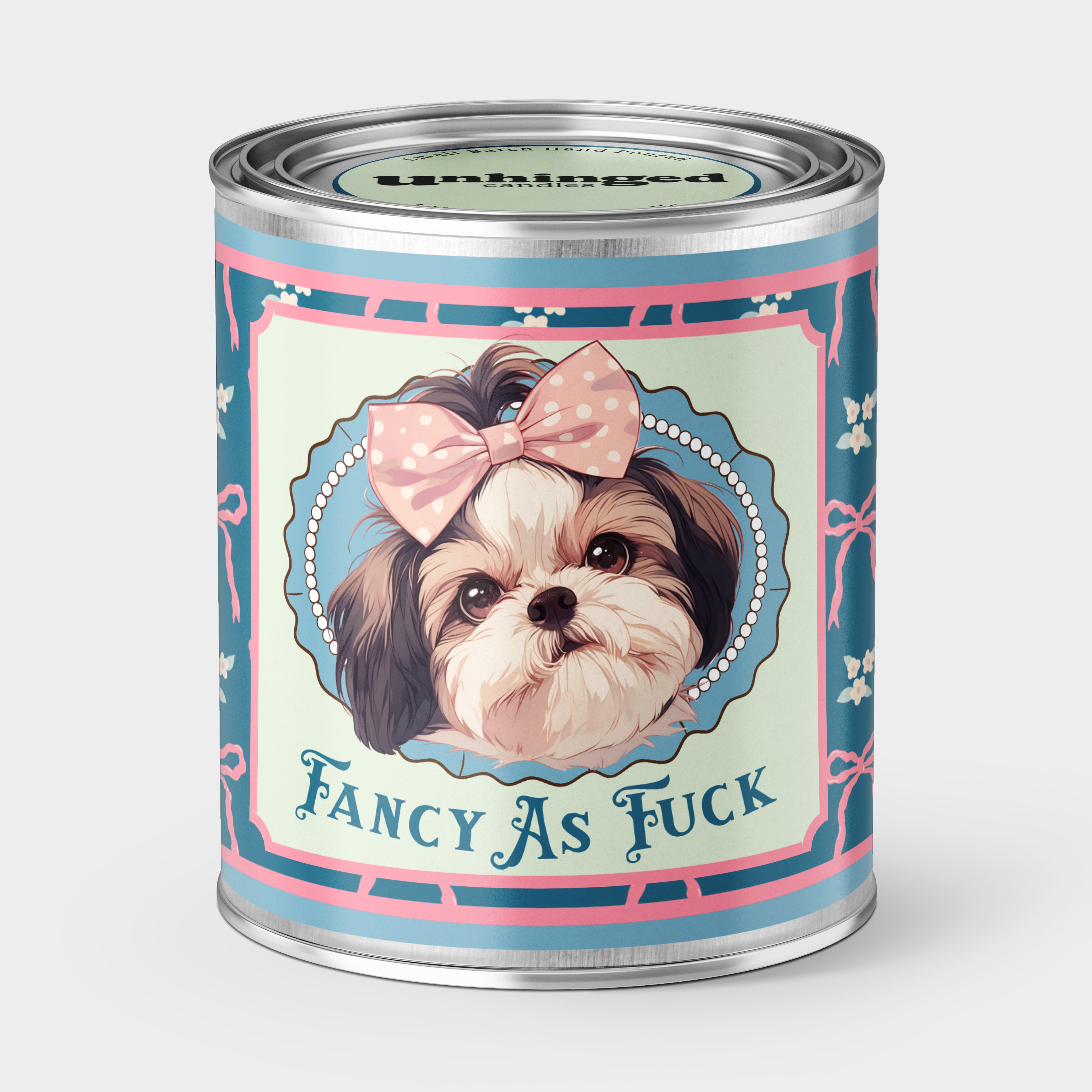 An Unhinged Paintcan candle with a picture of a cute puppy with a bow with the phrase "Fancy as fuck" on a blue and pink background. 