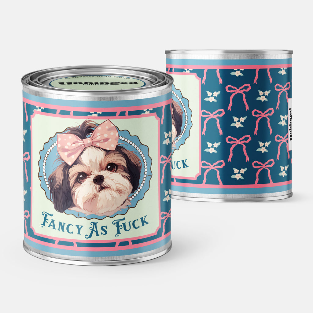 Front and back pic of An Unhinged Paintcan candle with a picture of a cute puppy with a bow with the phrase "Fancy as fuck" on a blue and pink background. 