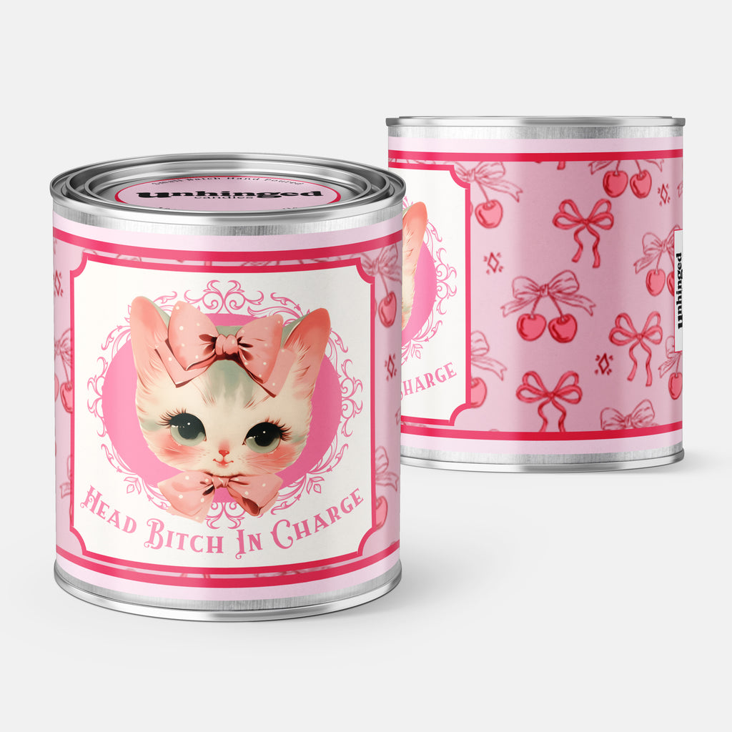 front and back pic of An Unhinged Candle Paintcan vessel with a label stating "Head bitch in charge" with a vintage illustration of a cute Kitten with pink and white striped background.