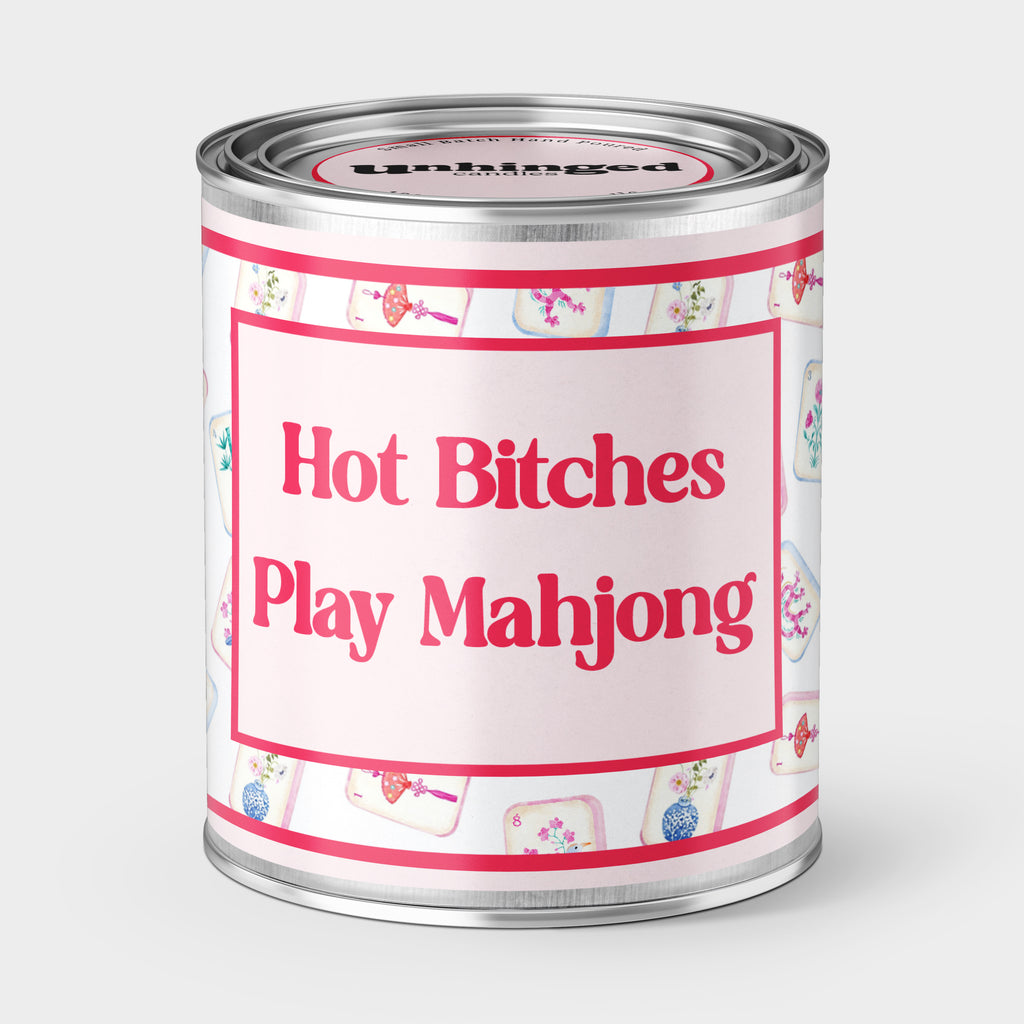 An unhinged Paintcan candle with the phrase "Hot Bitches Play Mahjong" with Mahjong tiles in the background. 