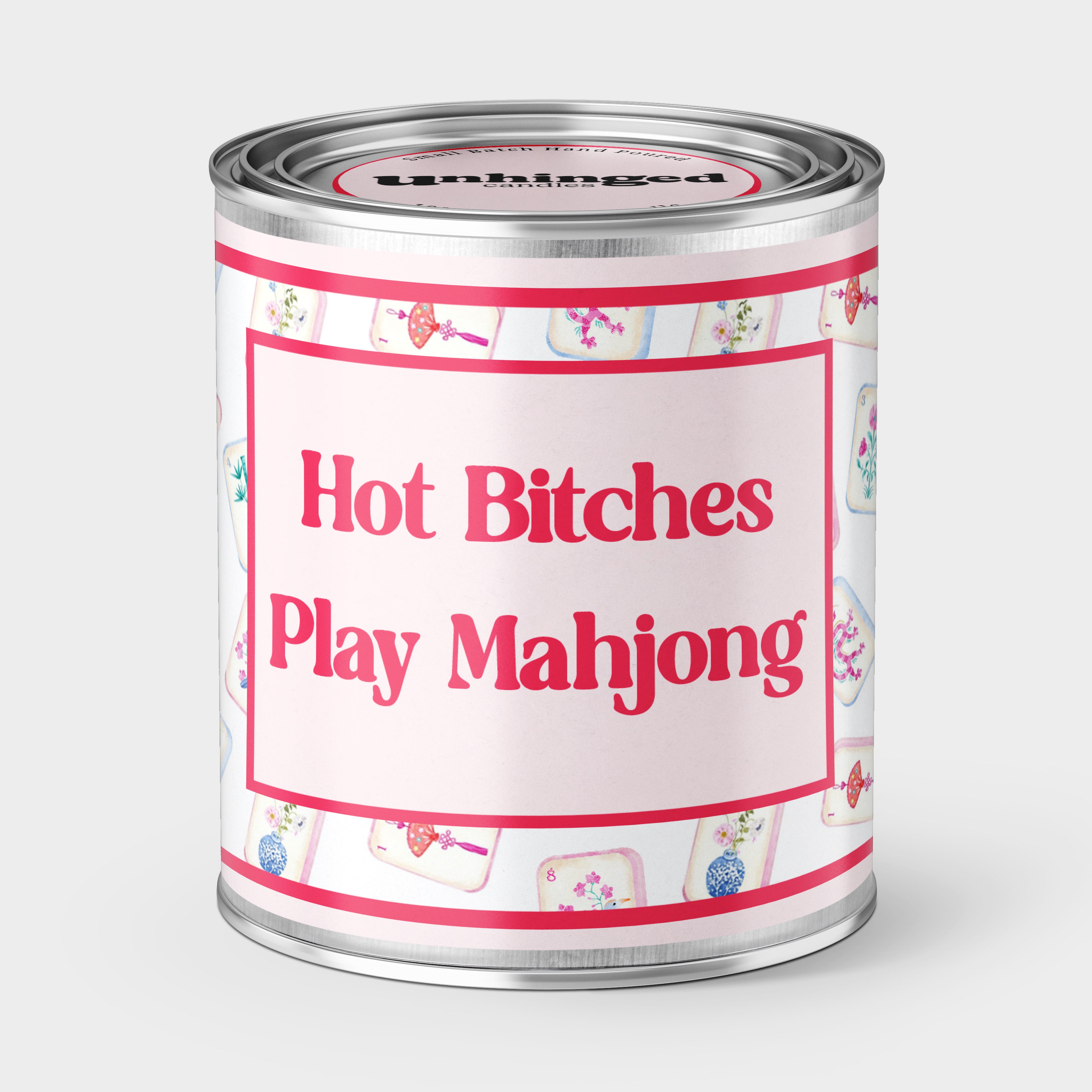 An unhinged Paintcan candle with the phrase "Hot Bitches Play Mahjong" with Mahjong tiles in the background. 