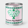 An Unhinged Paintcan Candle with two pickleball paddles crossed with the phrase "Hot Girls Play Pickleball"