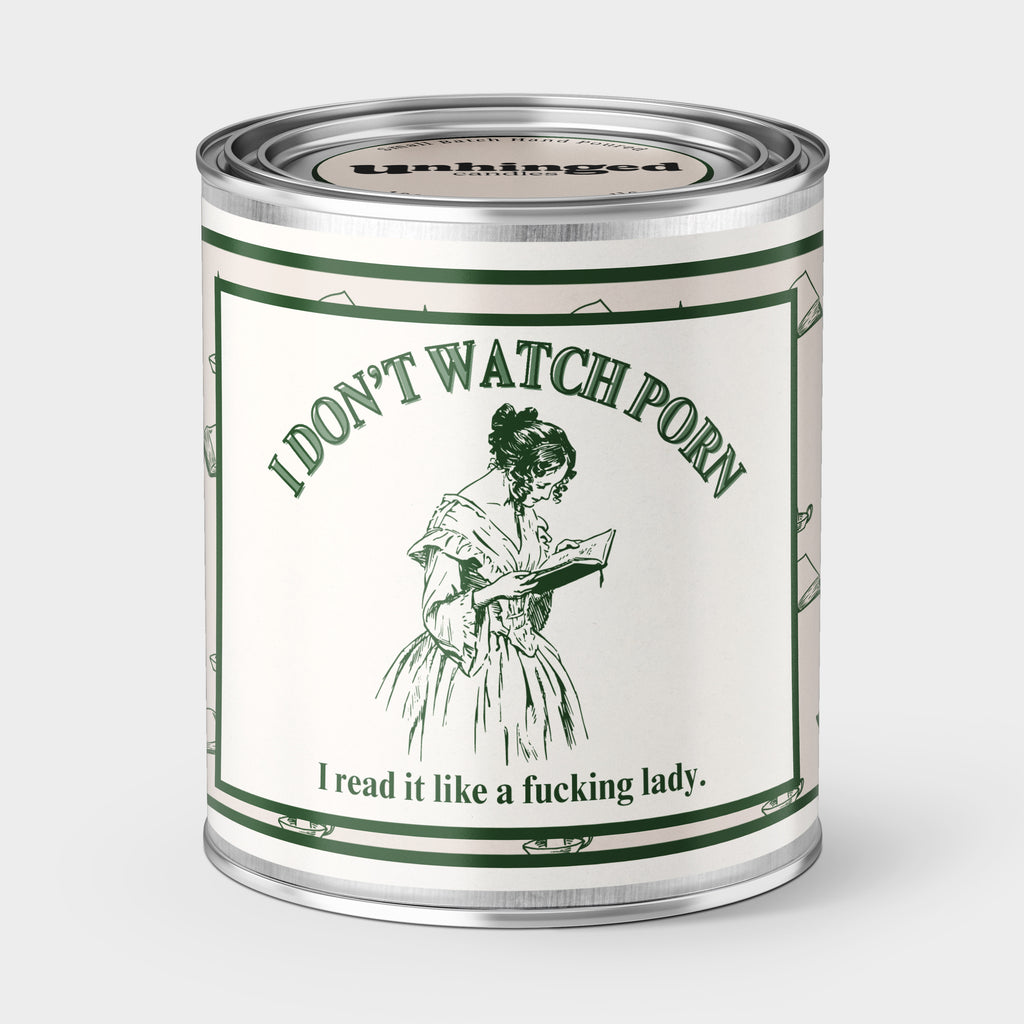 An Unhinged Candle Paintcan Vessel with a label stating "I don't watch porn I read it like a fucking lady" with a line drawing of a woman reading a book. Booktok fanfic smut