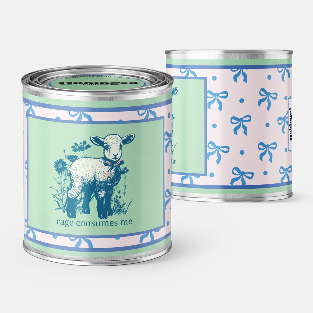 Front and back pic of An Unhinged Paintball Candle with a peaceful lamb with the phrase "Rage Consumes Me" on a green and white background with blue ribbons. 