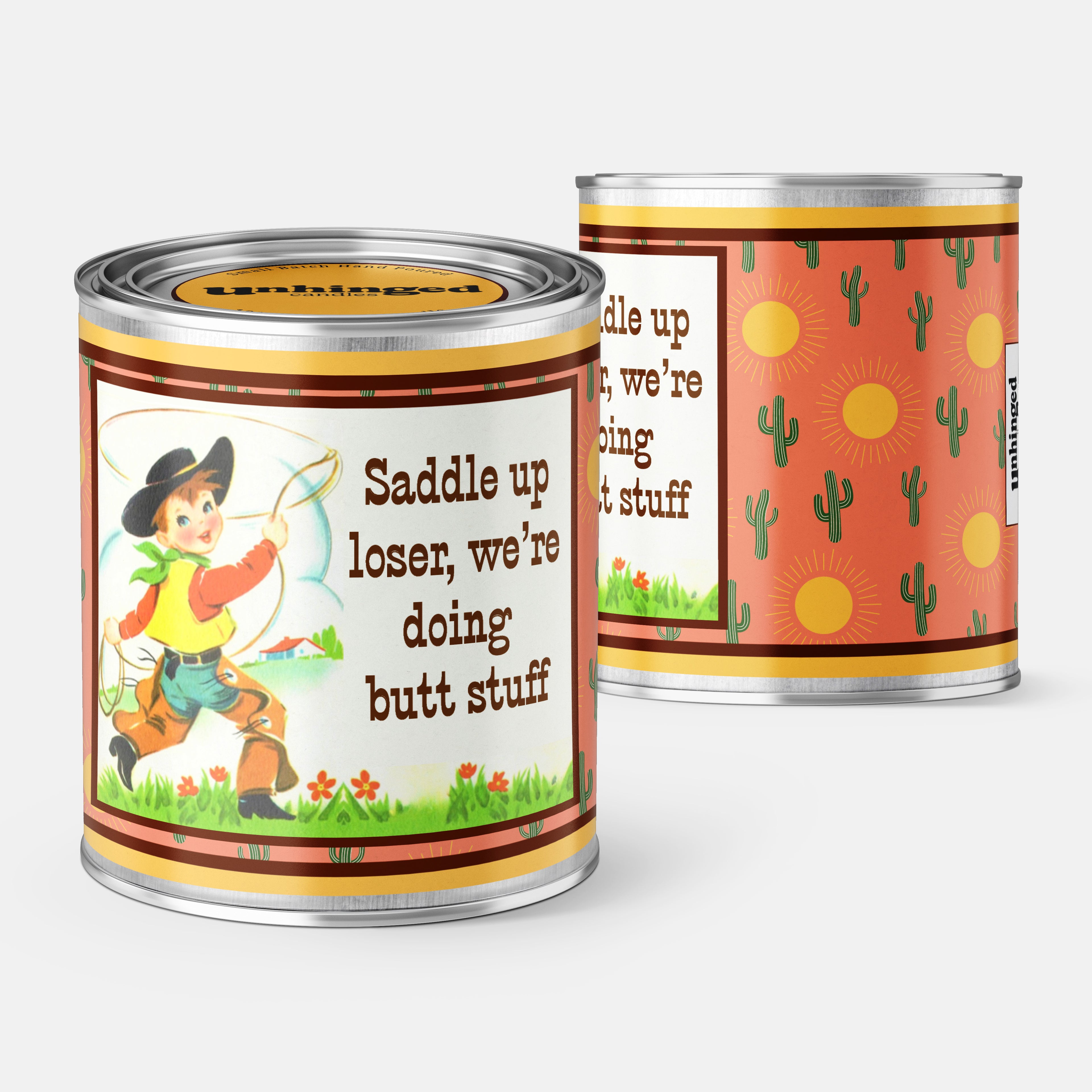 Front and back pic of An Unhinged Candle Paint Can Candle with a vintage cowboy in chaps with the phrase, "saddle up loser, we're doing butt stuff" 