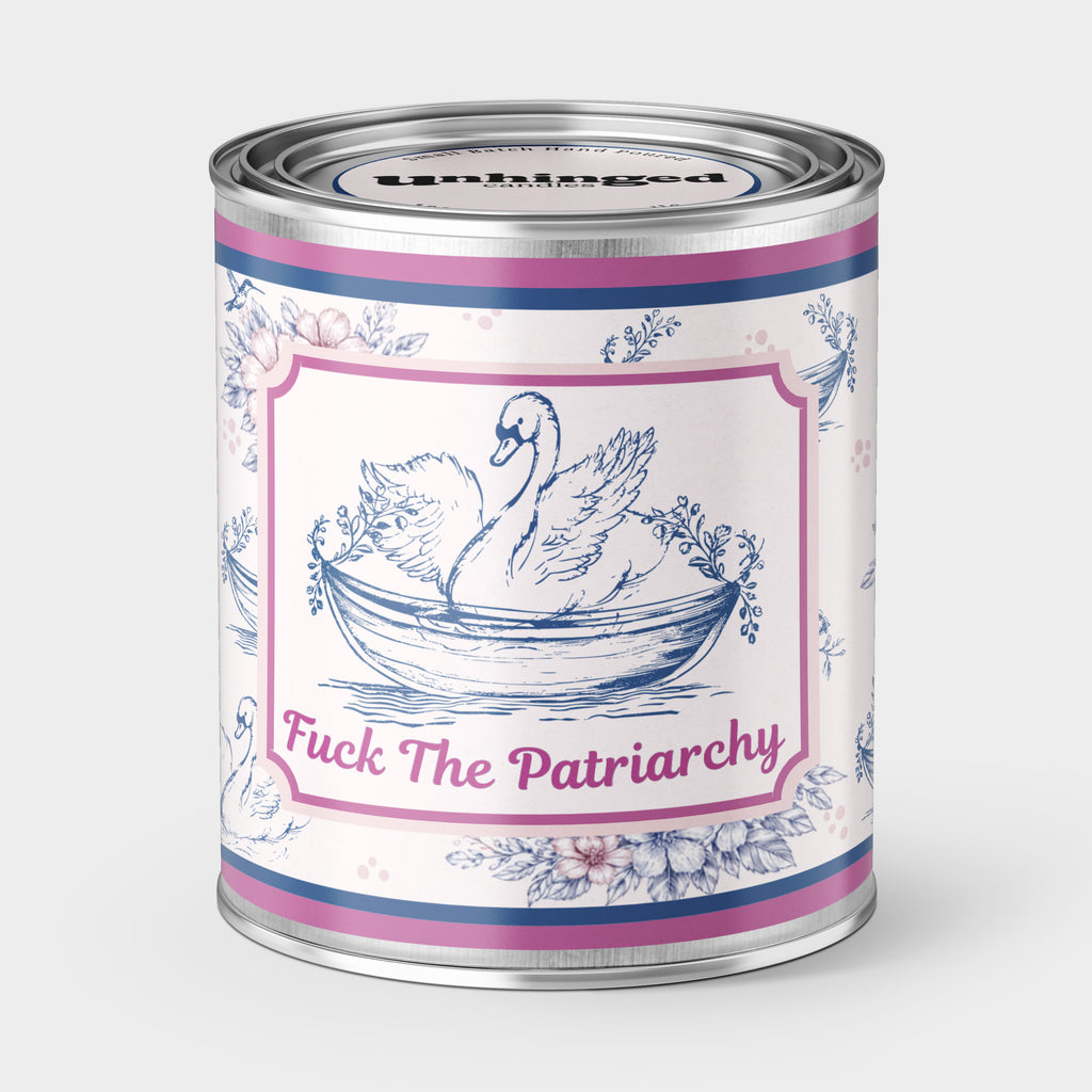 An Unhinged Paint Can Candle with a vintage swan design and 'Fuck The Patriarchy' text on a white background